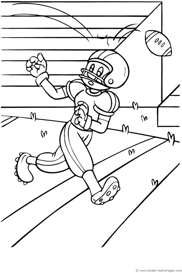 footballspieler-mit-ball-auf-dem-spielplatz